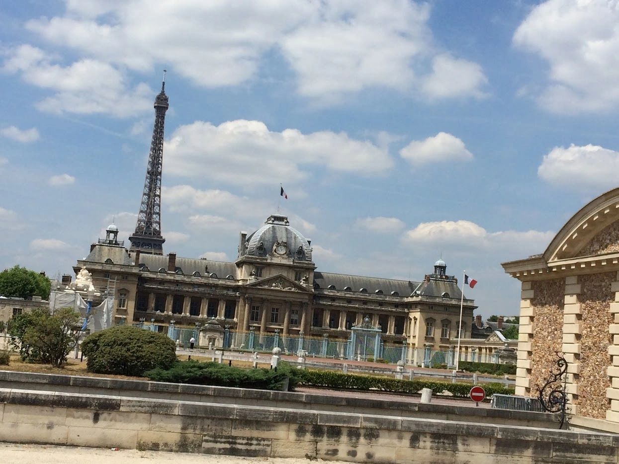 Eiffel Tower rising above historic Paris architecture